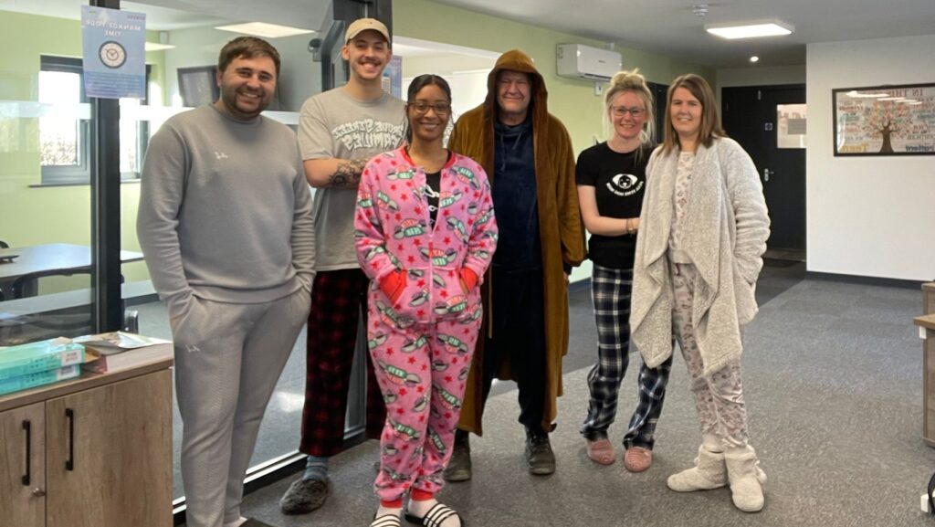 SDG Employee's wearing pyjamas in the office for stress awareness month
