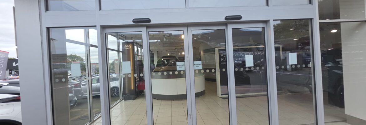 Large Automatic Telescopic Door Installation for Car Dealership