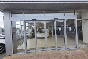 Large Automatic Telescopic Door Installation for Car Dealership